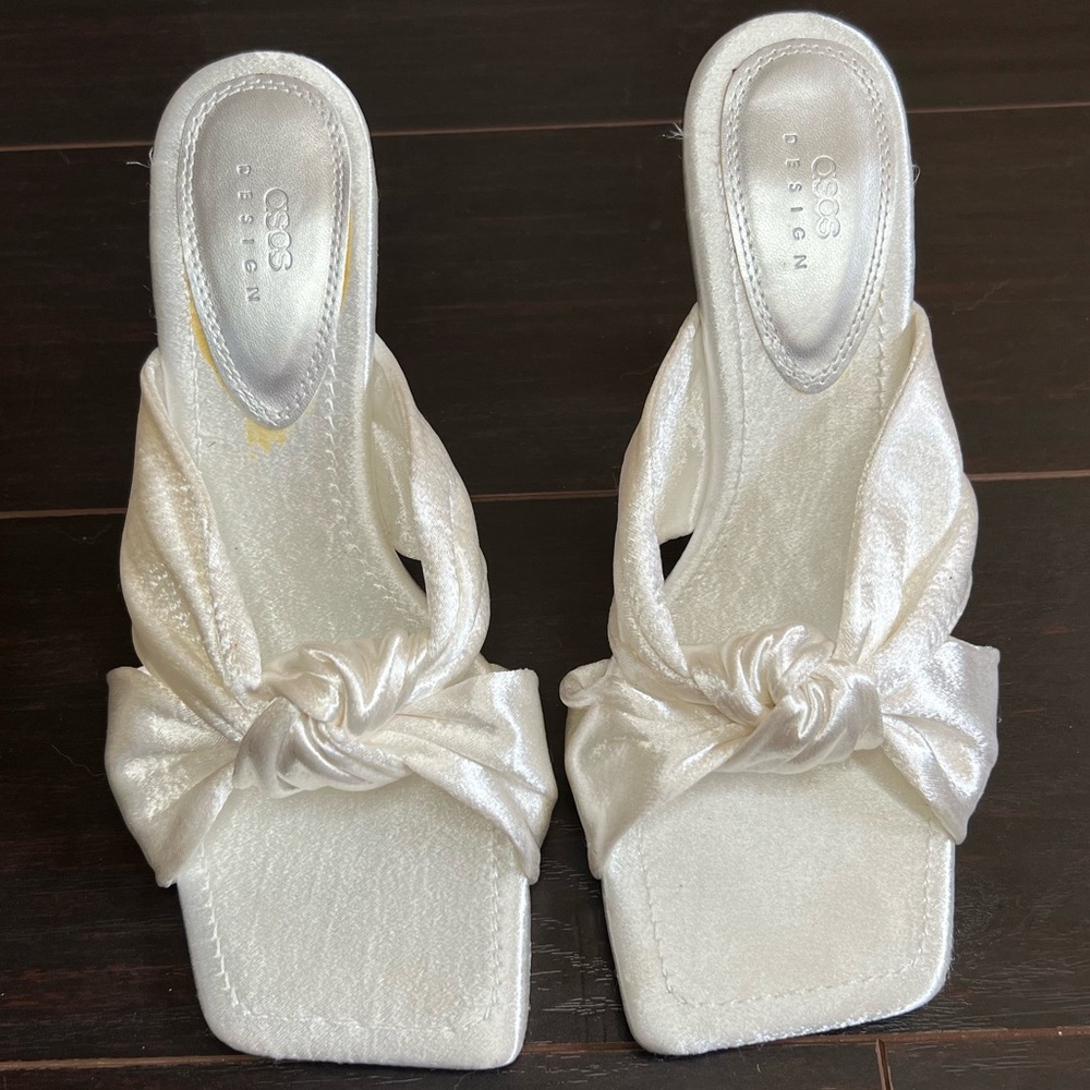 ASOS DESIGN Wide Fit Norbiton satin twist mules in ivory